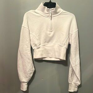 Cute quarter zip sweatshirt! So comfy and stylish (especially for traveling!).